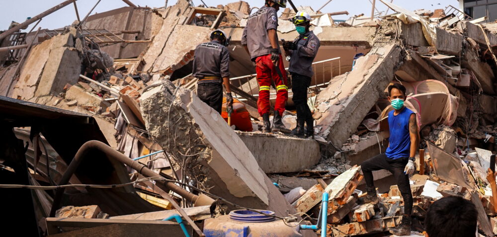 Rescuers work at the site of a building that collapsed, in the aftermath of a strong earthquake, in Mandalay, Myanmar, March 30, 2025. REUTERS/Stringer